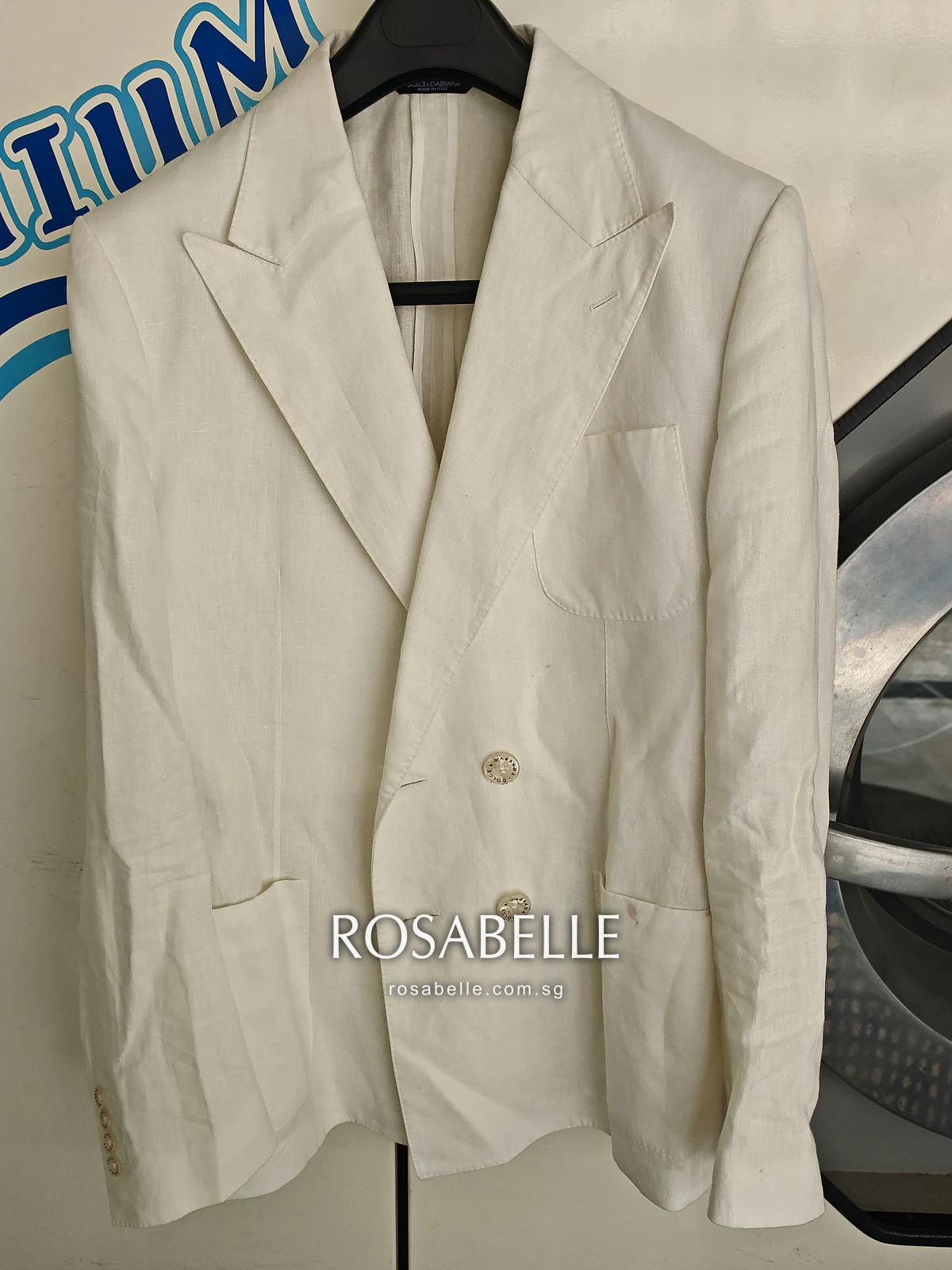 Cream Dolce and Gabbana double-breasted linen coat with red wine spots, before cleaning
