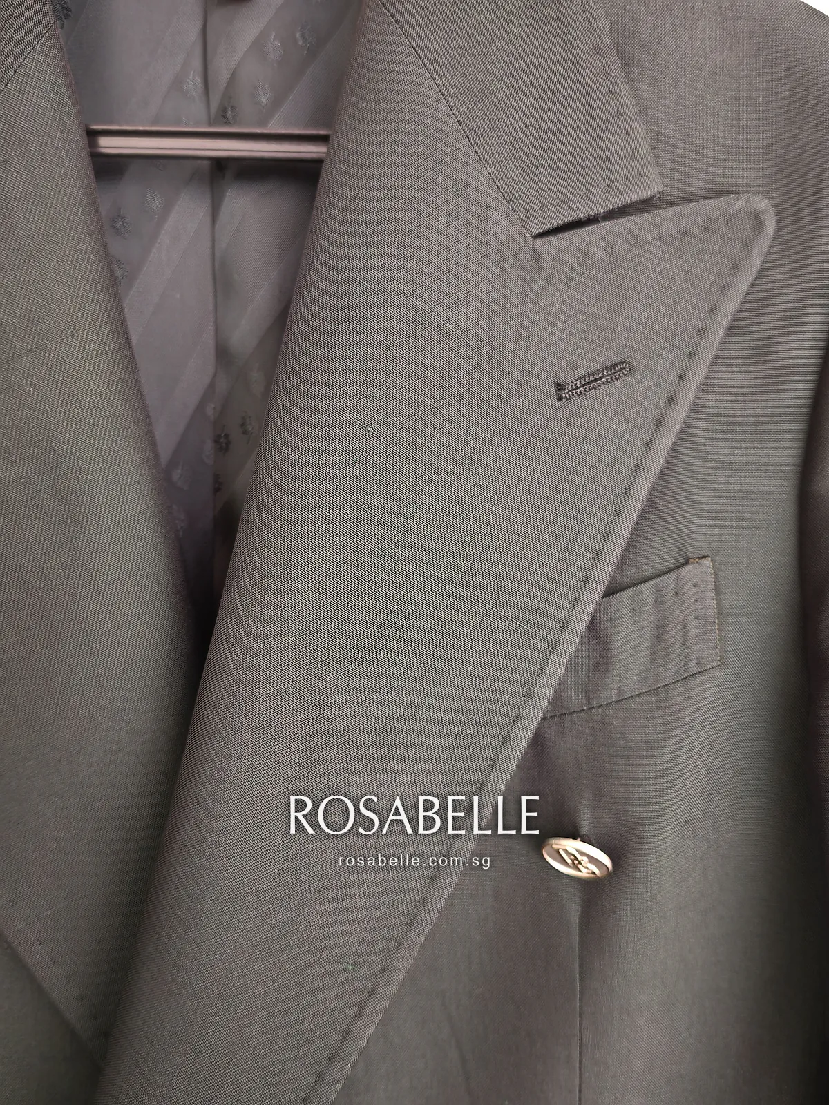 The same left lapel after the coconut oil came out, peak lapel, buttonhole and breast pocket on green silk