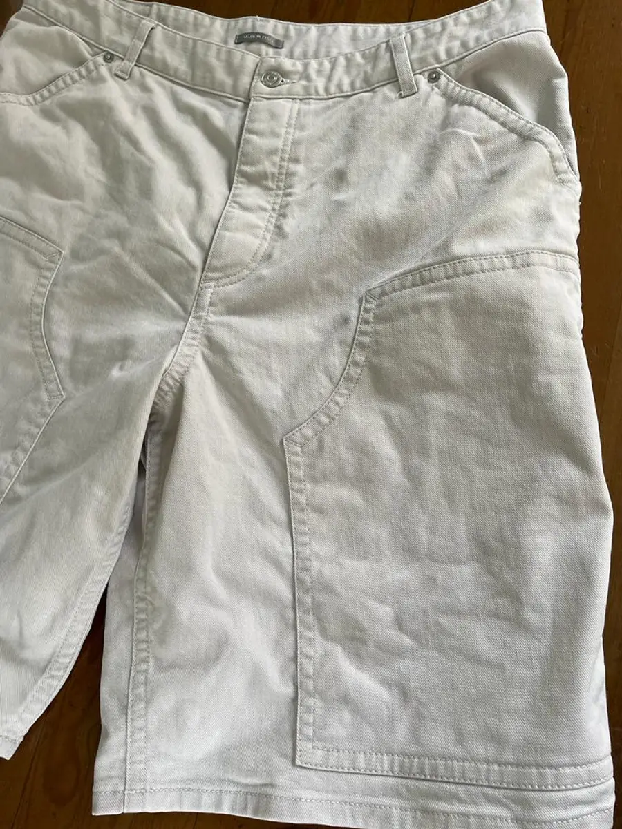 Christian Dior cream twill Bermudas with patchy grey discolouration after mud was washed out at home — Rosabelle Launderette case study