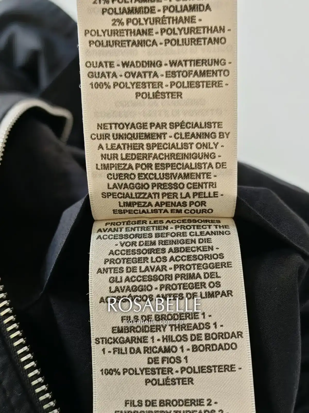 The Hermès jacket care label reading cleaning by a leather specialist only, and protect the accessories before cleaning