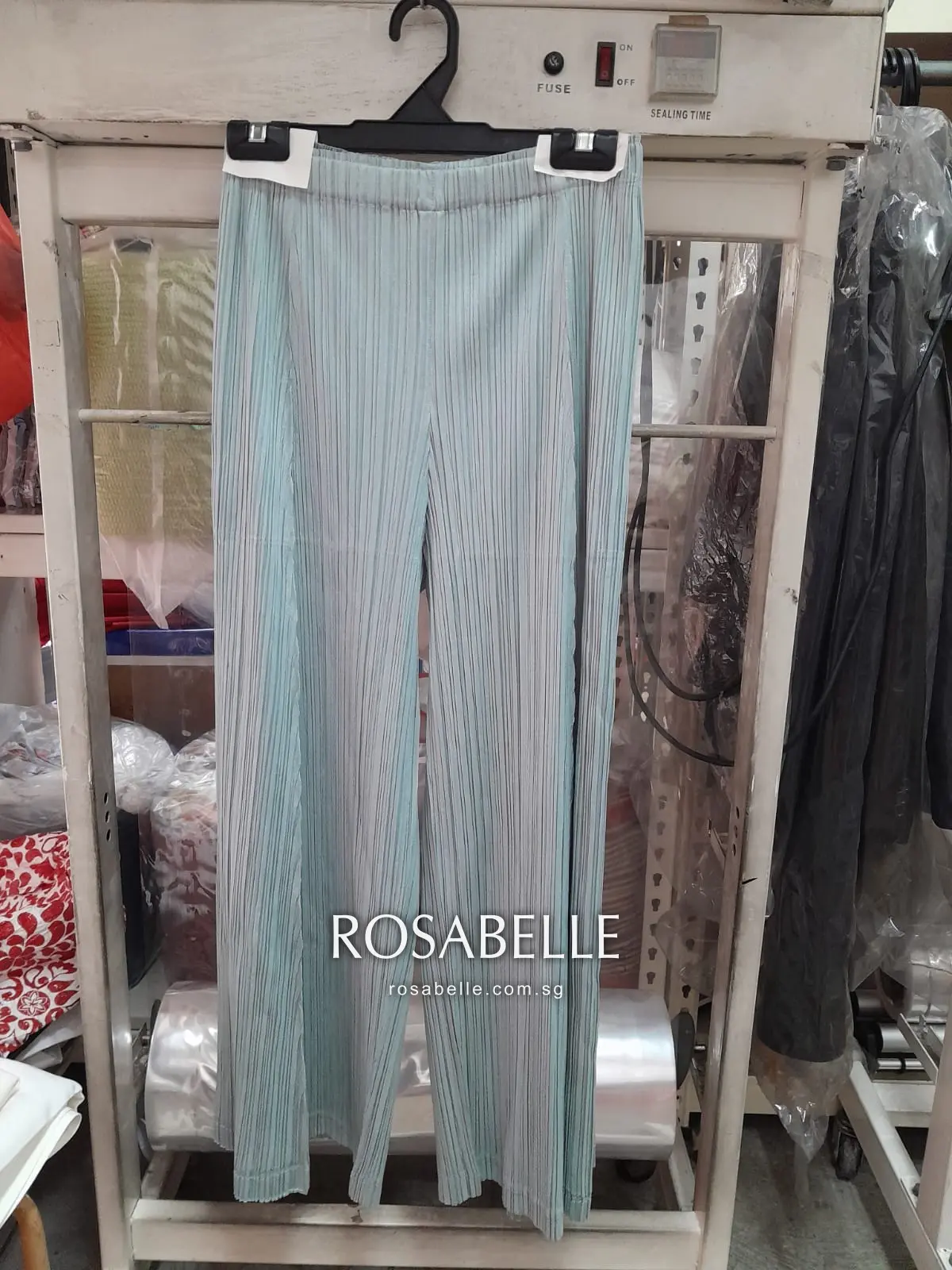 The same Pleats Please trousers clean with the pleating intact after cleaning at Rosabelle Launderette Singapore