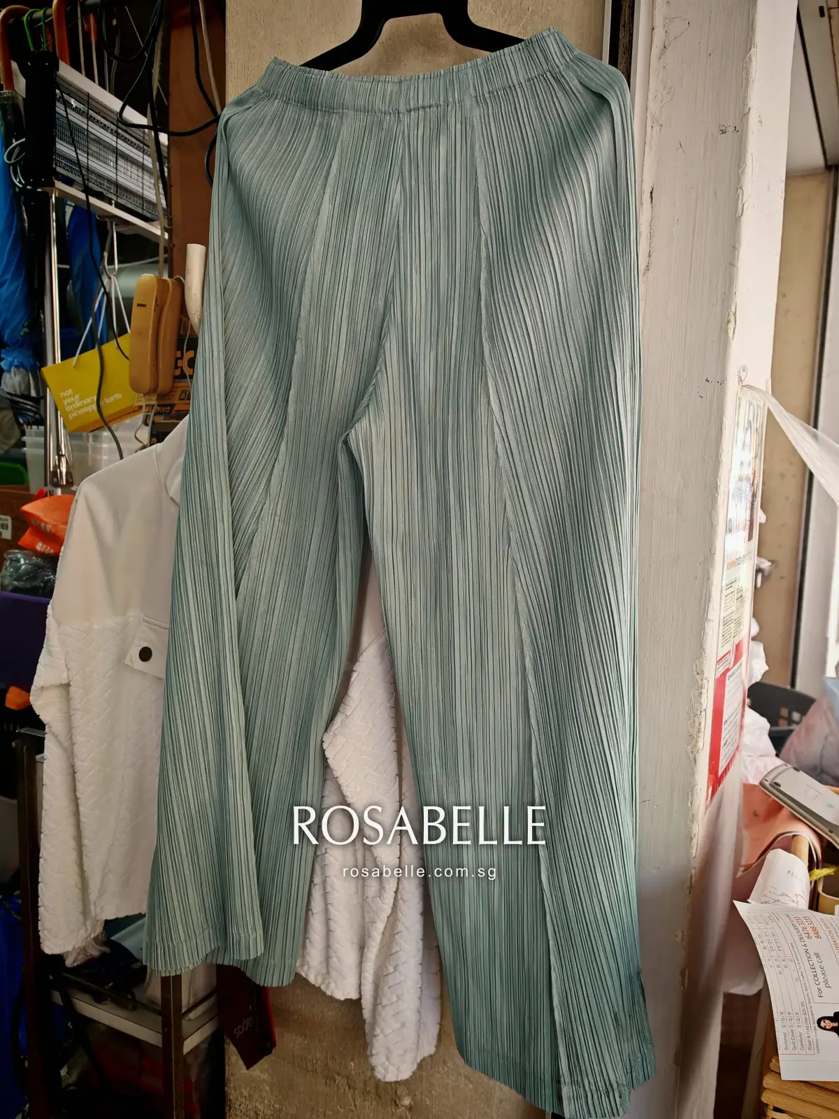 Issey Miyake Pleats Please trousers with heavy soiling before cleaning