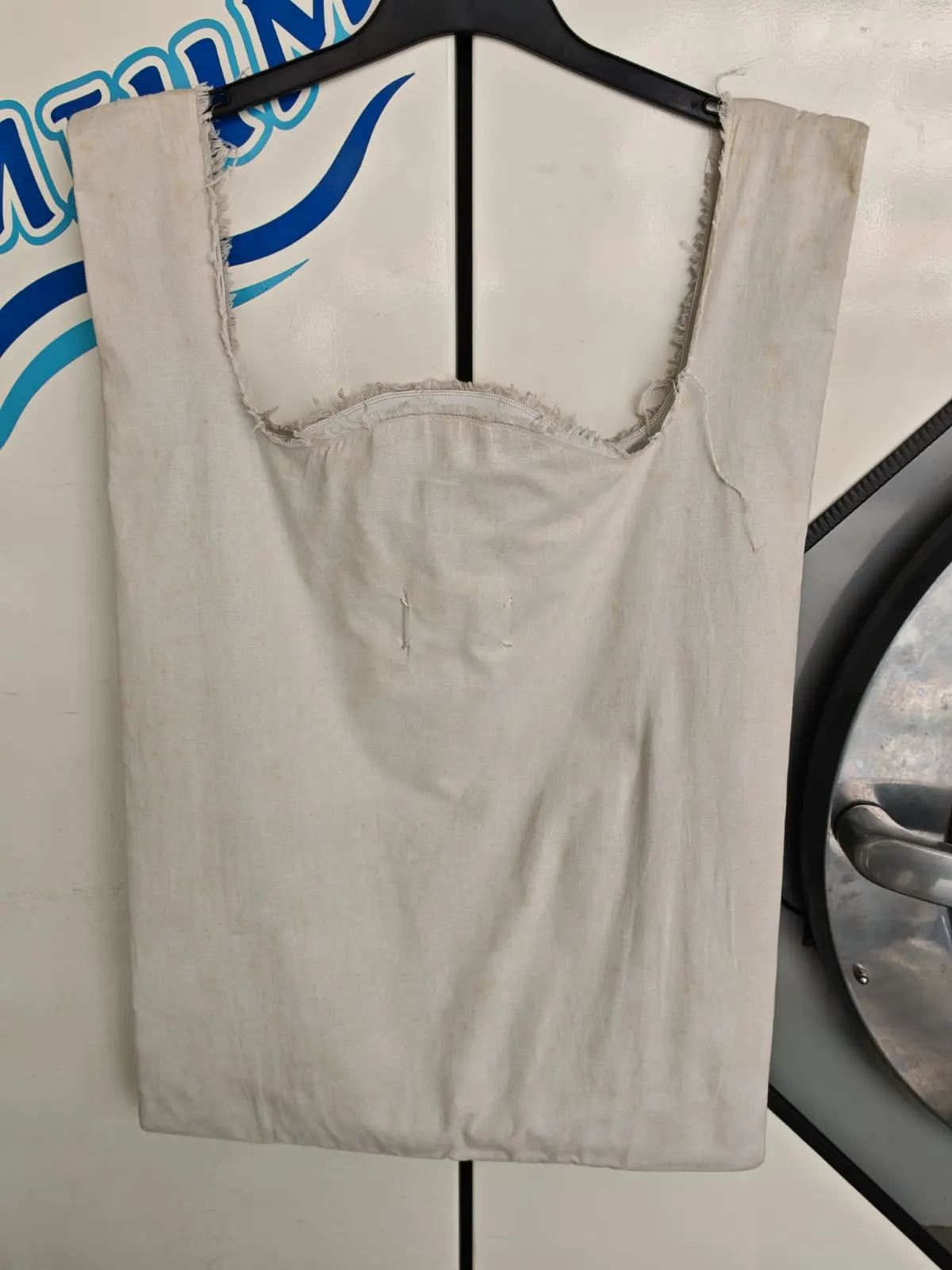 Reverse side of the same Maison Margiela tote after treatment, oxidation staining substantially removed by Rosabelle Launderette