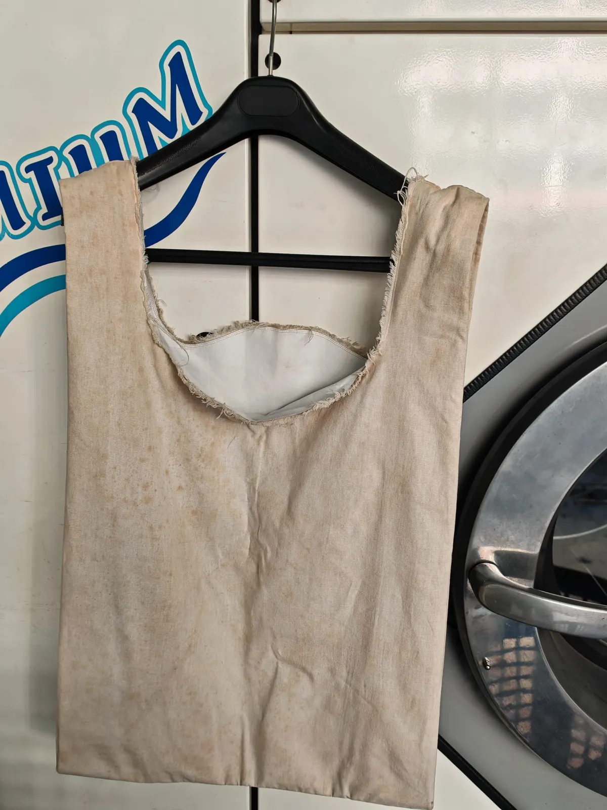 Maison Margiela shopping tote yellowed from uncleaned storage before treatment — Rosabelle Launderette case study
