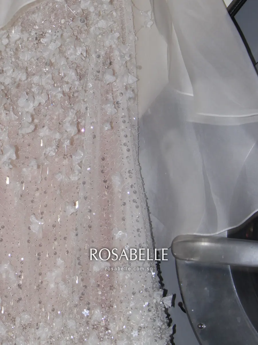 The beaded inner skirt after cleaning, petals standing clear of the sequinned ground with the chiffon beside it